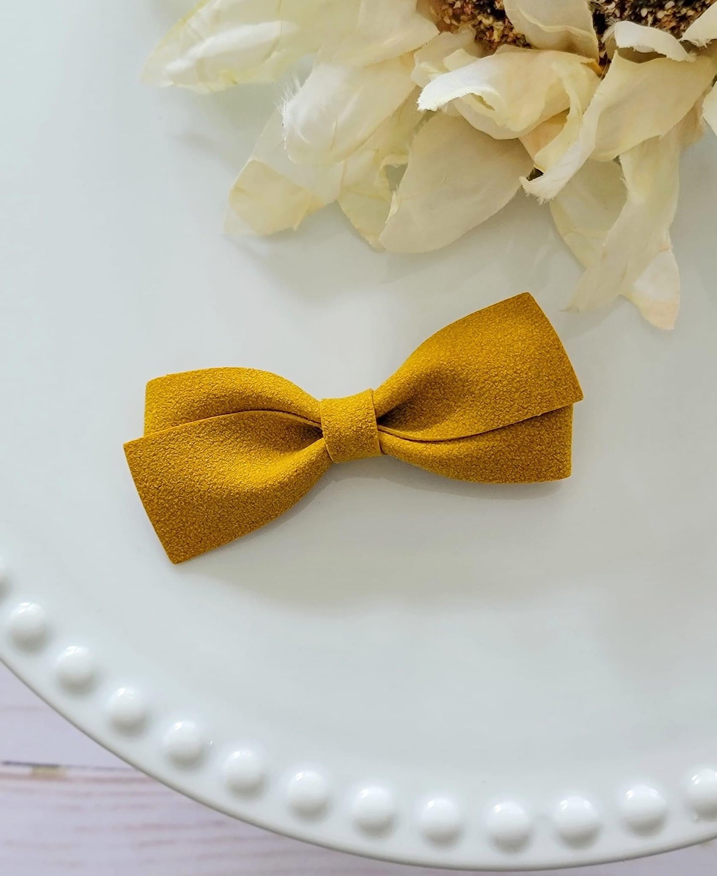 Anastasia Faux Leather Bow