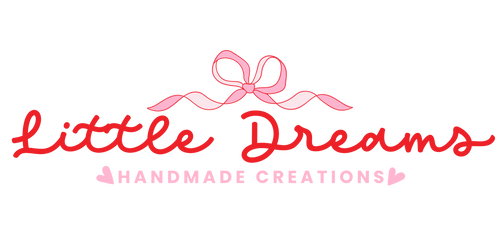 Logo of 'Little Dreams Handmade Creations' with a pink bow on a white background. Little Dreams is written with a cursive from in red, Handmade Creations is written in pink, between two little pink hearts.